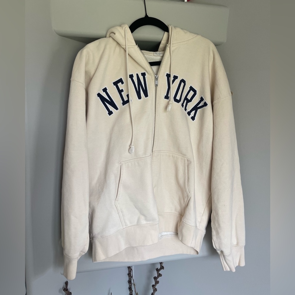 Brandy Melville new york cream zip up